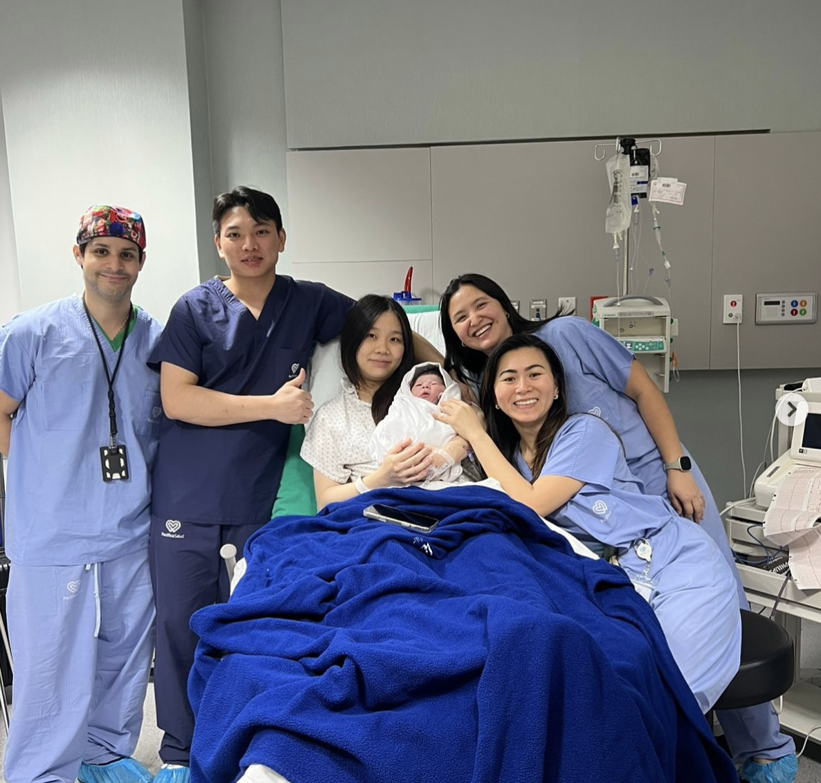 Happy family after delivery with Dra. Chong